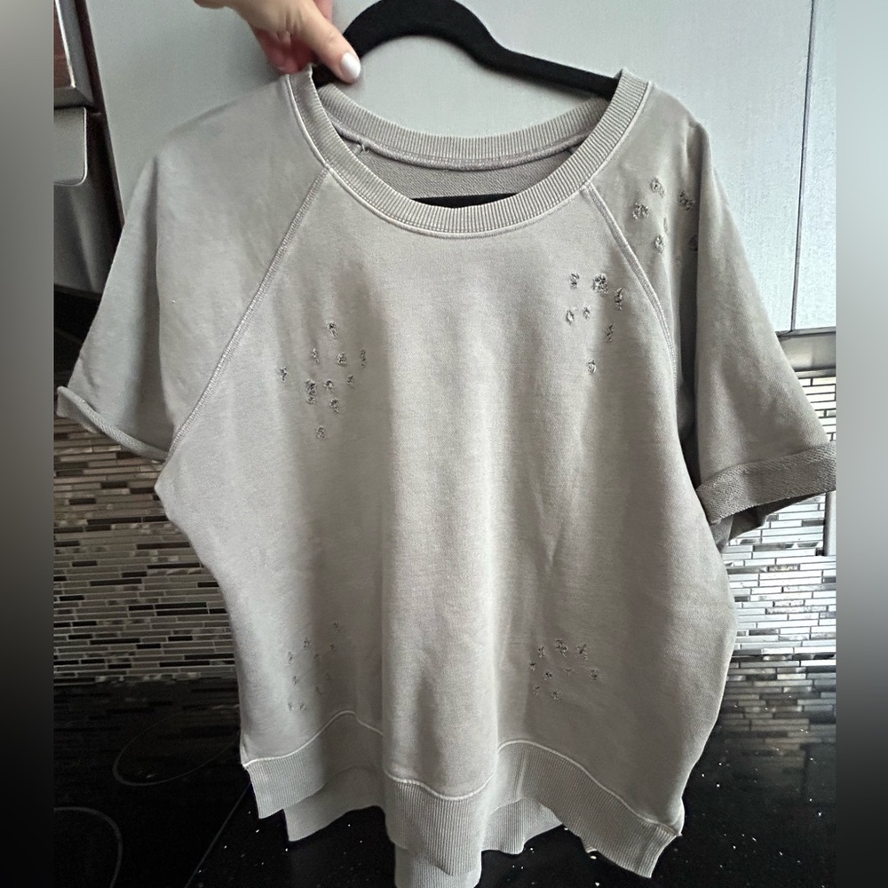 Distressed split hem shirt
